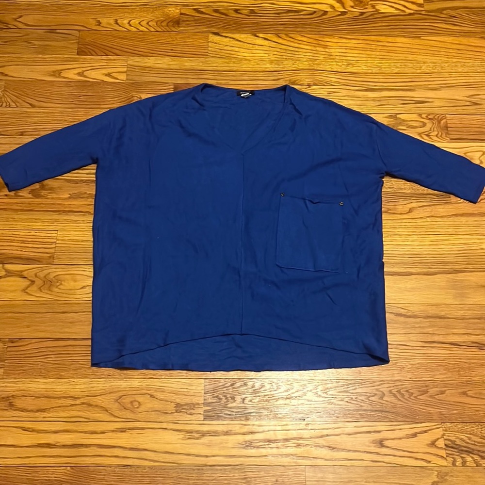 Kerisma cobalt blue sweater with 3/4 sleeves and pocket detail.